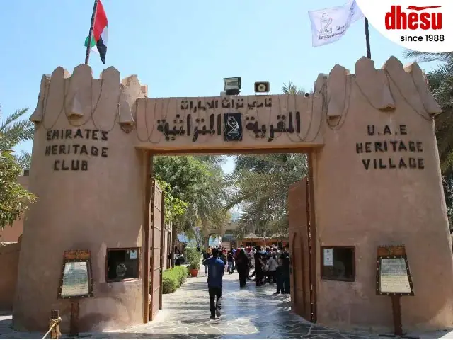 Sand-coloured gateway of a heritage village in the United Arab Emirates