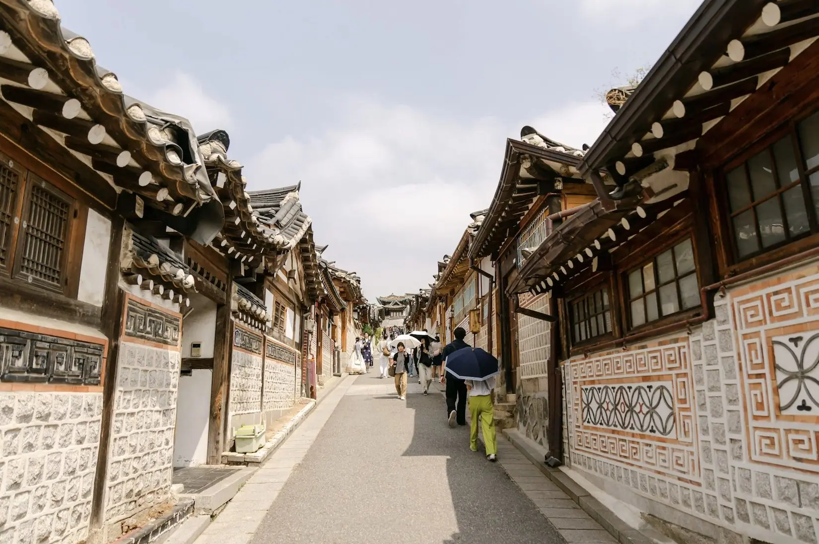 A lane of traditional tiled-roof hanok houses in Bukchon, Seoul